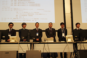 トレーナー：左から三宅基隆 氏，笹井信也 氏，木下琢実 氏，満崎克彦 氏，松田勝彦 氏，池野直哉 氏